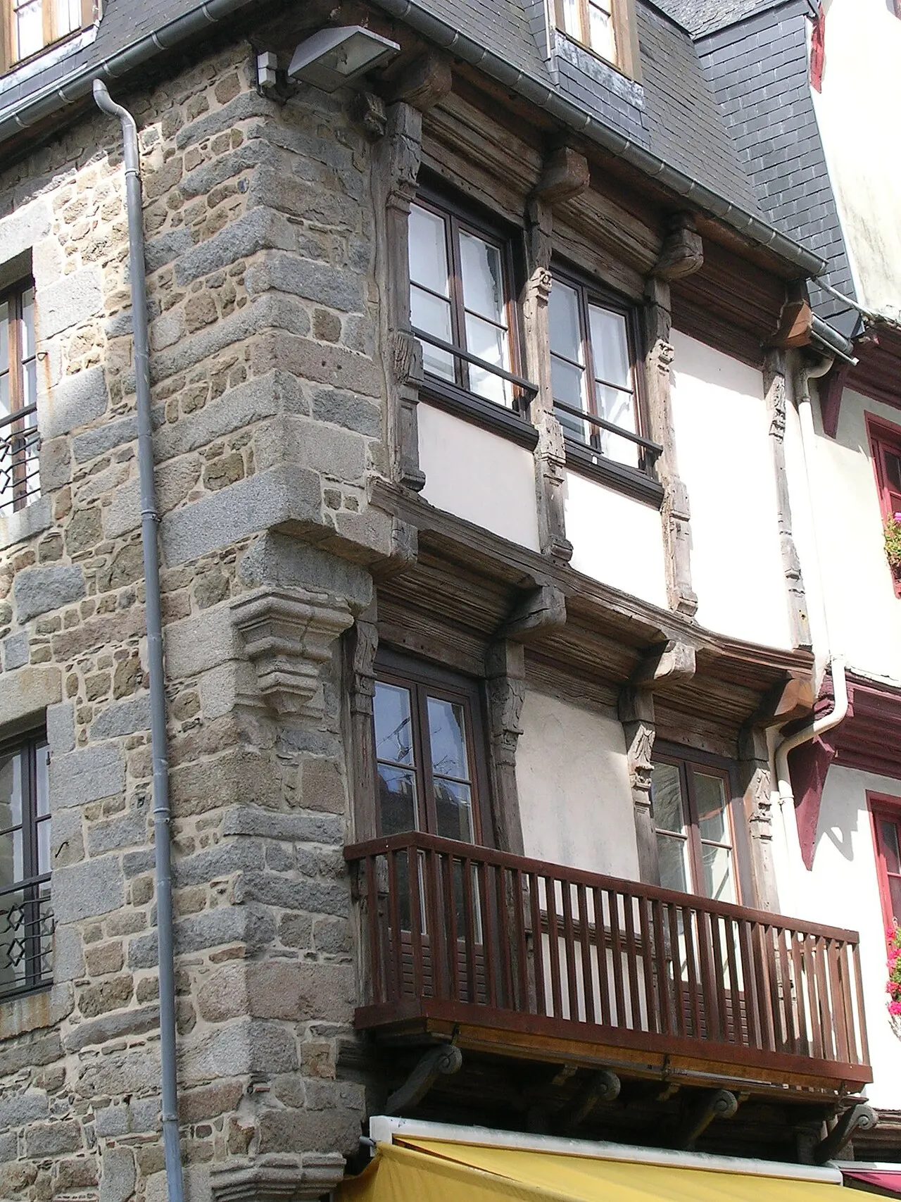 Maison d’angle à pans de bois